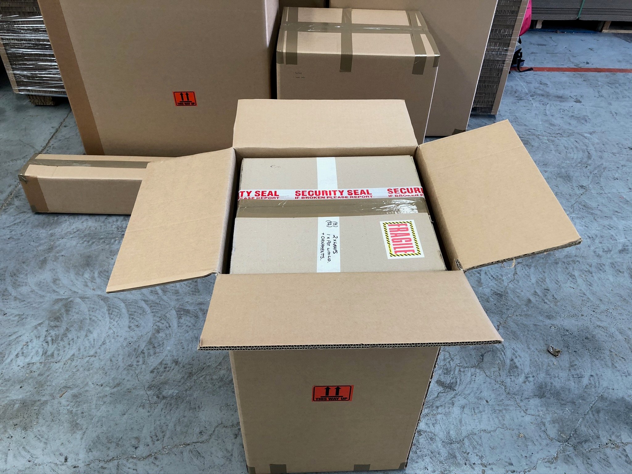 Rebul cardboard shipping box with custom internal supports for maximum product protection.